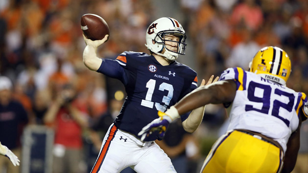 Sep 24, 2016; Auburn, AL, USA; Auburn Tigers quarterback Sean White (13) looks for a receiver as LSU Tigers lineman Lewis Neal (92) closes in during the third quarter at Jordan Hare Stadium. The Auburn Tigers beat the LSU Tigers 18-13. Photo Credit: John Reed-USA TODAY Sports