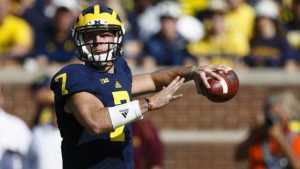 Michigan QB to be named Monday