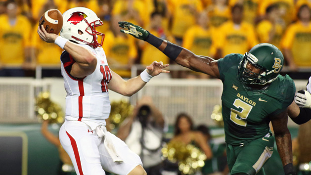 Sep 12, 2015; Waco, TX, USA; Baylor Bears defensive end Shawn Oakman (2) forces Lamar Cardinals quarterback Joe Minden (10) into a intentional grounding call during the second quarter at McLane Stadium. Mandatory Credit: Ray Carlin-USA TODAY Sports
