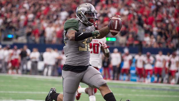 Oct 3, 2015; Arlington, TX, USA; Baylor Bears running back Shock Linwood (32) rushes for a touchdown against the Texas Tech Red Raiders during the first quarter at AT&T Stadium. Mandatory Credit: Jerome Miron-USA TODAY Sports