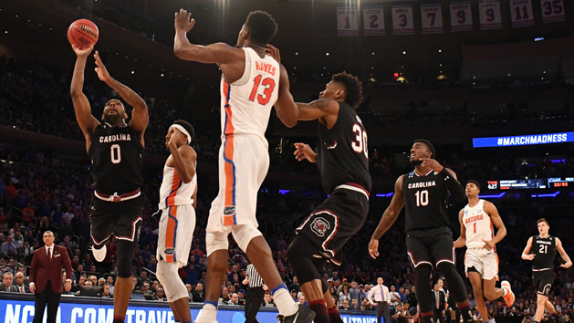 Mar 26, 2017; New York, NY, USA; South Carolina Gamecocks guard Sindarius Thornwell (0) shoots the ball against Florida Gators forward Kevarrius Hayes (13) during the second half in the finals of the East Regional of the 2017 NCAA Tournament at Madison Square Garden. Photo Credit: Robert Deutsch-USA TODAY Sports
