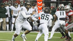 Michigan State upsets Ohio State, ruffles CFP feathers