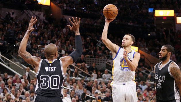 Apr 10, 2016; San Antonio, TX, USA; Golden State Warriors point guard Stephen Curry (30) shoots the ball over San Antonio Spurs power forward David West (30) during the second half at AT&T Center. Mandatory Credit: Soobum Im-USA TODAY Sports