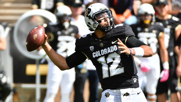 Oct 1, 2016; Boulder, CO, USA; Colorado Buffaloes quarterback Steven Montez (12) prepares to pass a touchdown to wide receiver Shay Fields (not pictured) in the first quarter against the Oregon State Beavers at Folsom Field. Photo Credit: Ron Chenoy-USA TODAY Sports