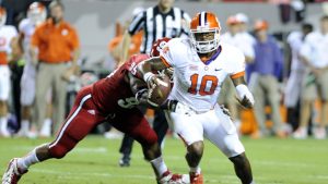 No. 3 Clemson stiff arms NC State for 26-14 win