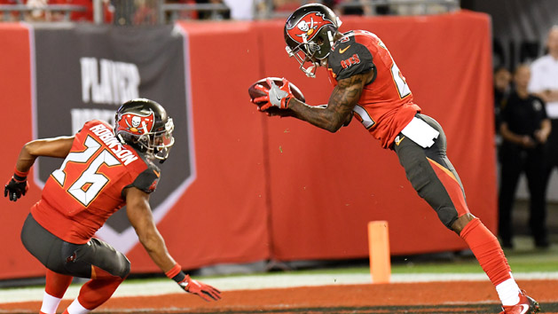 Dec 11, 2016; Tampa, FL, USA; Tampa Bay Buccaneers defensive back Ryan Smith (29) downs the ball after teammate Tampa Bay Buccaneers defensive back Josh Robinson (26) knocked it back on the field of play in the second half against the New Orleans Saints at Raymond James Stadium. The Tampa Bay Buccaneers defeated the New Orleans Saints 16-11. Photo Credit: Jonathan Dyer-USA TODAY Sports