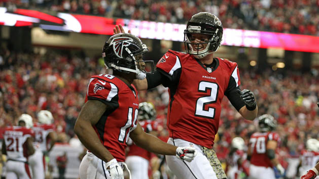 Nov 27, 2016; Atlanta, GA, USA; Atlanta Falcons quarterback Matt Ryan (2) celebrates the touchdown with wide receiver Taylor Gabriel (18) in the second quarter of their game against the Arizona Cardinals at the Georgia Dome. Mandatory Credit: Jason Getz-USA TODAY Sports