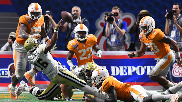 Sep 4, 2017; Atlanta, GA, USA; Georgia Tech Yellow Jackets quarterback TaQuon Marshall (16) is tackled by Tennessee Volunteers defensive lineman Darrell Taylor (19) on an unsuccessful two-point conversion attempt during overtime at Mercedes-Benz Stadium. Tennessee won 42-41 in two overtimes. Photo Credit: John David Mercer-USA TODAY Sports