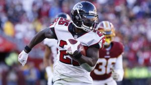 Falcons run over Redskins to even record