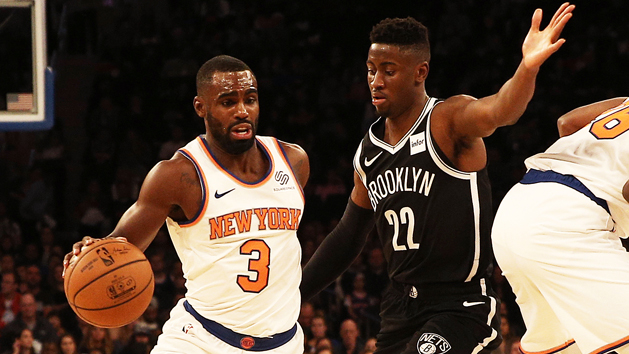 Oct 12, 2018; New York, NY, USA; New York Knicks guard Tim Hardaway Jr. (3) dribbles the ball while being defended by Brooklyn Nets guard Caris LeVert (22) during the first half at Madison Square Garden. Photo Credit: Andy Marlin-USA TODAY Sports