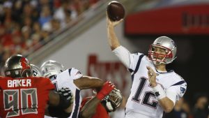 Brady, Patriots begin title defense against Chiefs