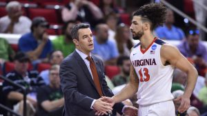Coach goes down, but Virginia rolls to 81-45 win
