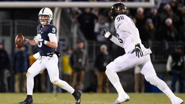 Nov 26, 2016; University Park, PA, USA; Penn State Nittany Lions quarterback Trace McSorley (9) scrambles out of the pocket as Michigan State Spartans defensive end Demetrius Cooper (98) defends during the fourth quarter at Beaver Stadium. The Nittany Lions won 45-12. Photo Credit: Rich Barnes-USA TODAY Sports