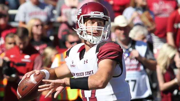 Sep 30, 2017; Fayetteville, AR, USA; New Mexico State Aggies quarterback Tyler Rogers (17) throws a pass in the first quarter against the Arkansas Razorbacks at Donald W. Reynolds Razorback Stadium. Photo Credit: Nelson Chenault-USA TODAY Sports