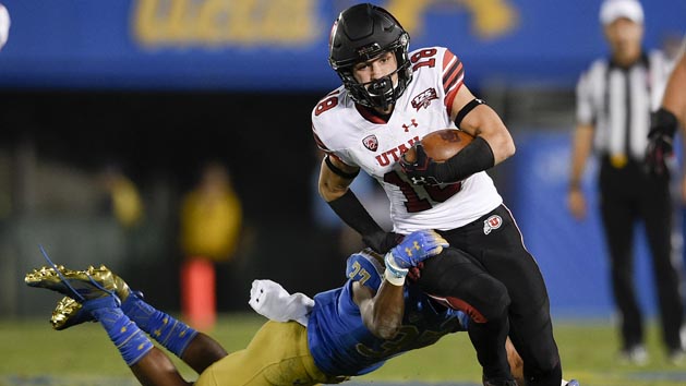 Oct 26, 2018; Pasadena, CA, USA; Utah Utes wide receiver Britain Covey (18) runs after the catch while defended by UCLA Bruins defensive back Quentin Lake (37) during the first half at Rose Bowl. Photo Credit: Kelvin Kuo-USA TODAY Sports