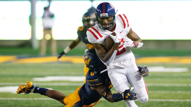 Sep 16, 2017; Berkeley, CA, USA; California Golden Bears safety Jaylinn Hawkins (6) attempts to tackle Mississippi Rebels wide receiver Van Jefferson (12) during the third quarter at Memorial Stadium. Photo Credit: Stan Szeto-USA TODAY Sports