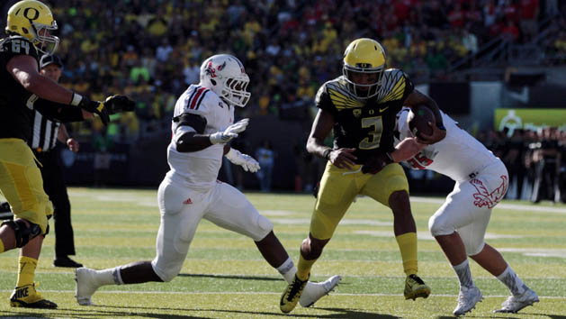 Sep 5, 2015; Eugene, OR, USA; Oregon Ducks quarterback Vernon Adams Jr. (3) runs the ball past Eastern Washington Eagles linebacker Alek Kacmarcik (35) at Autzen Stadium. Scott Olmos-USA TODAY Sports