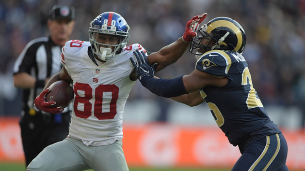 Oct 23, 2016; London, United Kingdom; New York Giants receiver Victor Cruz (80) is defended by Los Angeles Rams strong safety T.J. McDonald (25) on a 25-yard reception during game 16 of the NFL International Series at Twickenham Stadium. Photo Credit: Kirby Lee-USA TODAY Sports