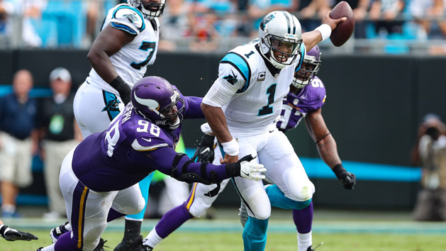 Sep 25, 2016; Charlotte, NC, USA; Minnesota Vikings defensive tackle Linval Joseph (98) dives to tackle Carolina Panthers quarterback Cam Newton (1) during the second quarter at Bank of America Stadium. Photo Credit: Jim Dedmon-USA TODAY Sports