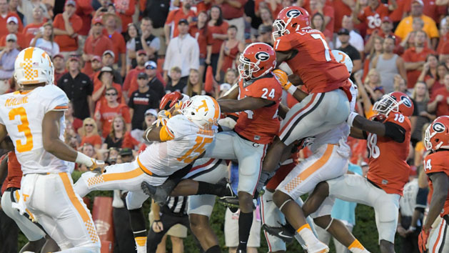 Oct 1, 2016; Athens, GA, USA; Tennessee Volunteers wide receiver Jauan Jennings (15) catches a game winning touchdown pass in front of Georgia Bulldogs safety Dominick Sanders (24) on the last play on the game during the fourth quarter at Sanford Stadium. Tennessee defeated Georgia 34-31. Photo Credit: Dale Zanine-USA TODAY Sports
