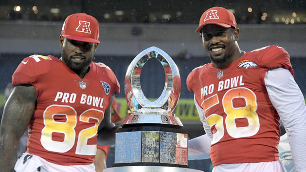 Jan 28, 2018; Orlando, FL, USA; AFC tight end Delanie Walker of the Tennessee Titans (82) and outside linebacker Von Miller of the Denver Broncos (58) pose with the most valuable player trophy at the 2018 NFL Pro Bowl at Camping World Stadium. The AFC defeated the NFC 24-23. Photo Credit: Kirby Lee-USA TODAY Sports