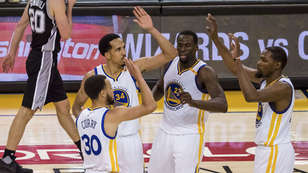 May 14, 2017; Oakland, CA, USA; Golden State Warriors guard Stephen Curry (30) high fives guard Shaun Livingston (34), forward Draymond Green (23) and forward Kevin Durant (35) after a basket against the San Antonio Spurs during the fourth quarter in game one of the Western conference finals of the 2017 NBA Playoffs at Oracle Arena. Photo Credit: Kelley L Cox-USA TODAY Sports