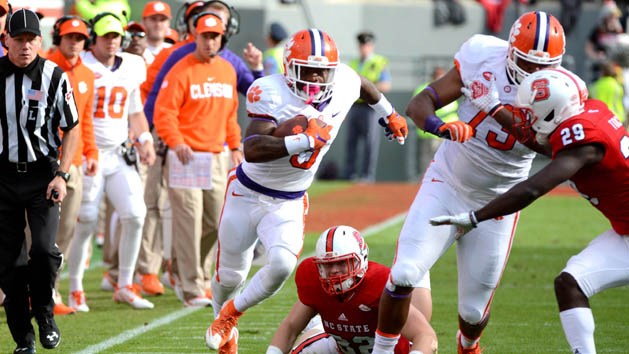 Oct 31, 2015; Raleigh, NC, USA; Clemson Tigers running back Wayne Gallman (9) runs the ball during the first half against the North Carolina State Wolfpack at Carter Finley Stadium. Mandatory Credit: Rob Kinnan-USA TODAY Sports