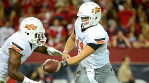 Oklahoma State QB Lunt transferring to Illinois