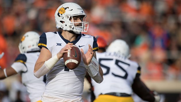 Nov 17, 2018; Stillwater, OK, USA; West Virginia Mountaineers quarterback Will Grier (7) looks to pass against the Oklahoma State Cowboys during the first quarter at Boone Pickens Stadium. Photo Credit: Rob Ferguson-USA TODAY Sports