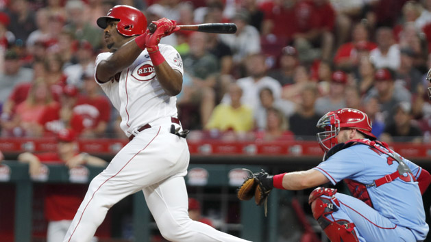Jul 20, 2019; Cincinnati, OH, USA; Cincinnati Reds right fielder Yasiel Puig (66) hits an RBI double against the St. Louis Cardinals during the seventh inning at Great American Ball Park. Photo Credit: David Kohl-USA TODAY Sports