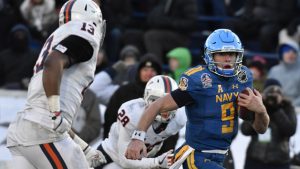 Abey helps Navy sink Virginia in Military Bowl