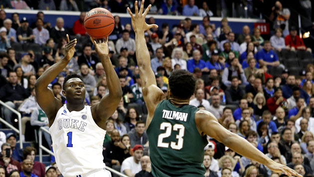 Mar 31, 2019; Washington, DC, USA; Duke Blue Devils forward Zion Williamson (1) shoots the ball against Michigan State Spartans forward Xavier Tillman (23) during the second half in the championship game of the east regional of the 2019 NCAA Tournament at Capital One Arena. Photo Credit: Geoff Burke-USA TODAY Sports